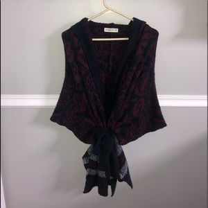 Poncho like wrap tie sweater